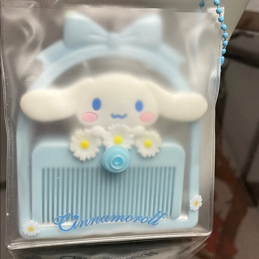 Sanrio Cinnamoroll Blue Handheld Mirror and Comb Set with Daisy Accents